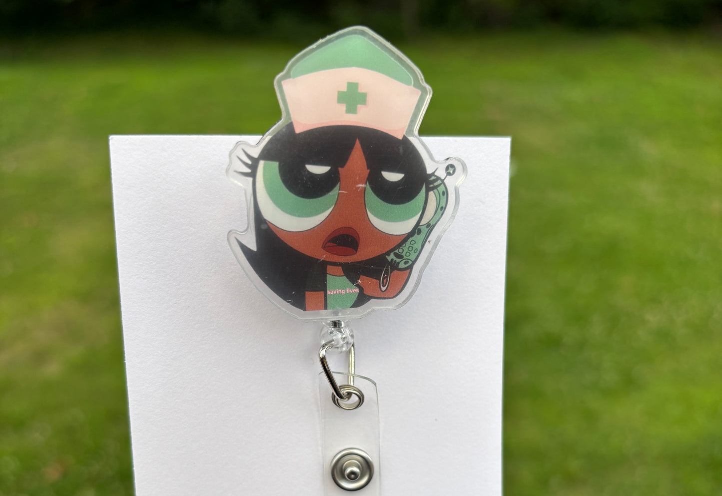 Green Saving Lives Badge Reel